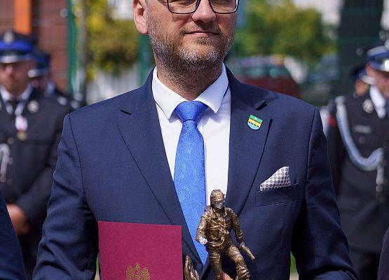 Grafika 33: Gminni druhowie i Wójt na Powiatowym Dniu Strażaka